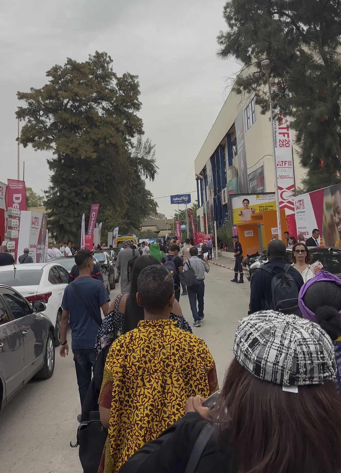 The group making its way along a busy street