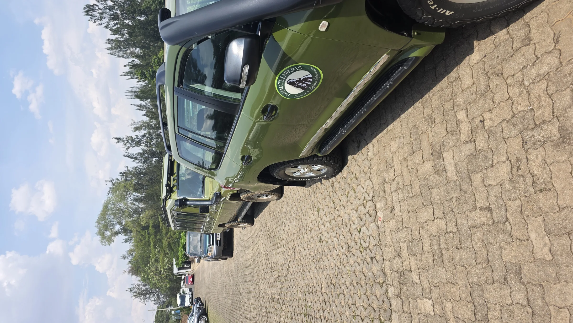 The safari jeep waiting on the cobblestones