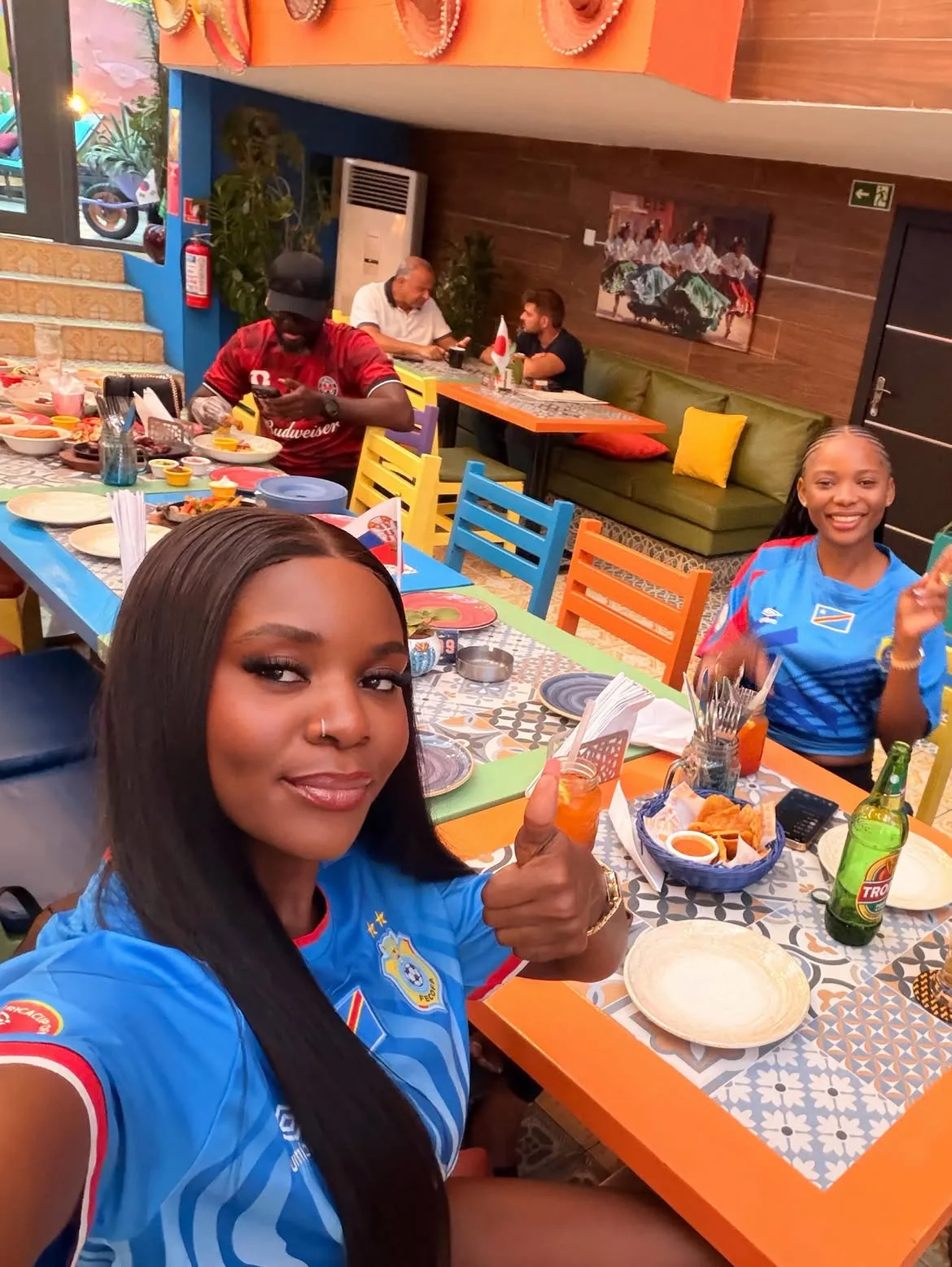 A member at the table in her team jersey