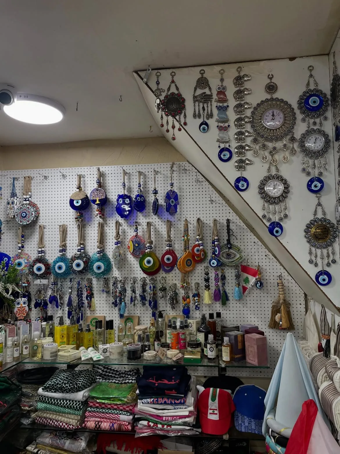 A craft stall hung with keyrings and trinkets